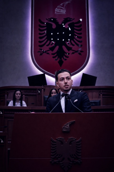 Geart Ferhati speaking at the Albanian Parliament