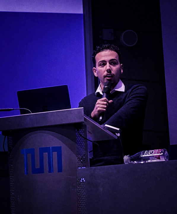 Geart Ferhati on stage at TUM